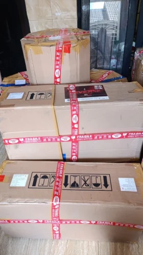 Packing dan pengiriman pesanan Drumband Juara