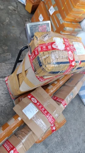 Packing dan pengiriman pesanan Drumband Juara