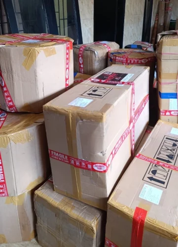 Packing dan pengiriman pesanan Drumband Juara