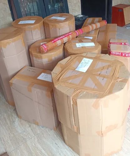 Packing dan pengiriman pesanan Drumband Juara